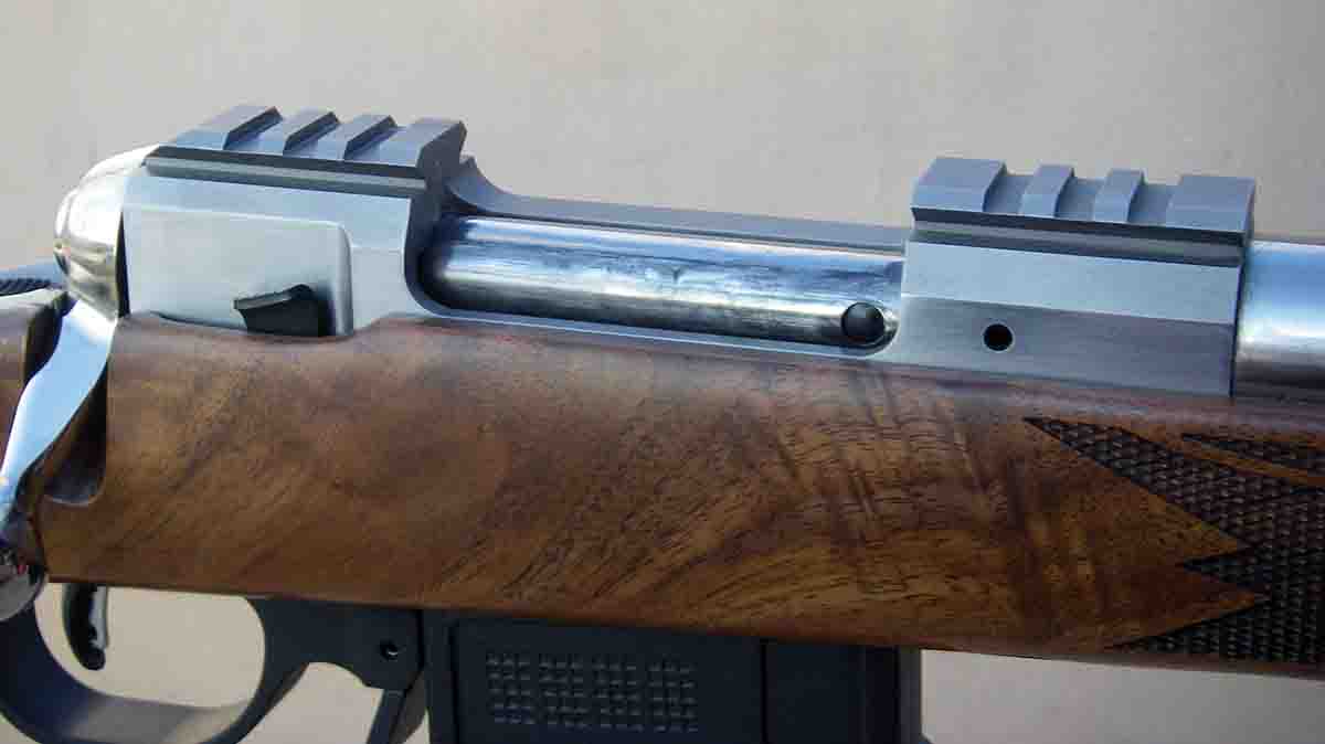 The Mk. X includes integral cross-slot scope-mounting bases machined as part of the receiver.